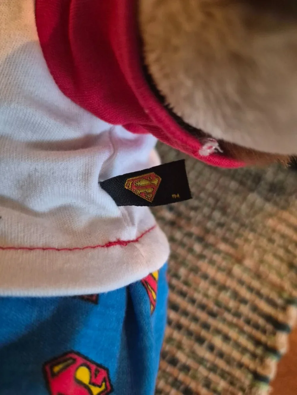 Build-A-Bear Workshop teddy bear wears a casual Superman-themed outfit with bows